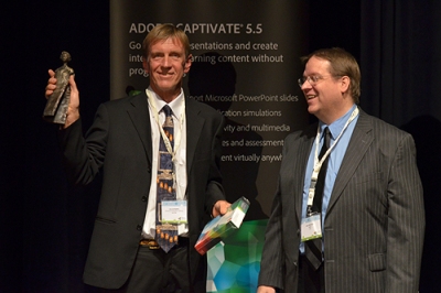 Uwe Gutwirth receiving his award from Allen Partridge