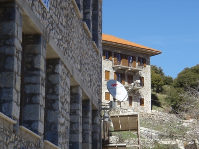 The DVB-RCS antenna on the wall of the School of Valtetsiniko