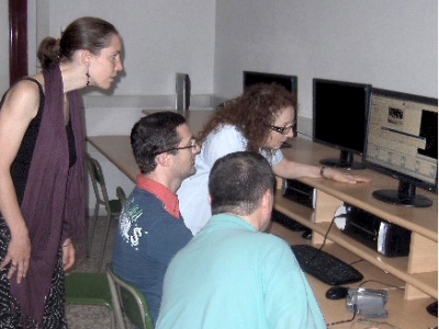 Italian teachers at work editing their videos Italian teachers at work editing their videos
