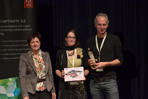 Vicky Vermeulen and Swen Vincke receiving their award from Marina De Moerlooze 